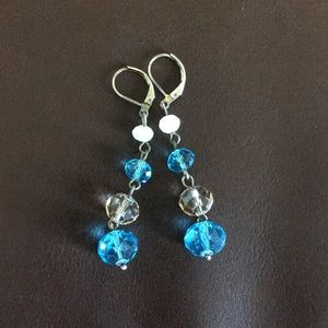 Blue and white dangly earring never worn